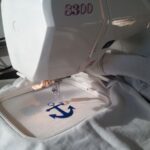 Machine embroidery hoops and stabilizers